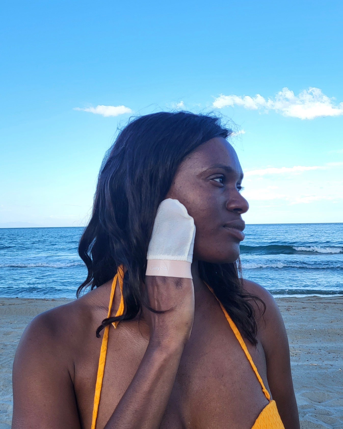 Gant exfoliant en soie pour visage